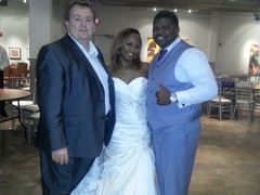 Professor Jam shown with another satisfied bride and groom at Westside Cultural Arts Center where he was the General Manager and emceed the reception